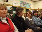 Pat Gilmore (left) and other union members attending the school board meeting on March 16th.