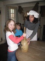 Children learn about life in colonial America at the Sands Ring Homestead Museum.