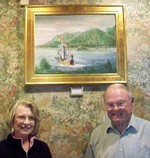 Ed Moulton and Mary Ann G. Neuman, head of the Culture in Cornwall Committee, with his painting of the Half Moon on the Hudson.