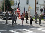 Members of the Armed Forces color guard kicked off the parade.