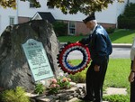 Bill Fulton placed the wreath on the World War I memorial.