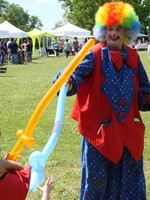 Binky the clown made animal balloons for the little ones.