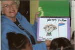 Colette Fulton and the book the children made for her.