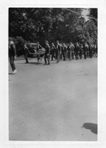 Cub Pack marching.