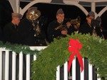 The brass section of the NYMA band