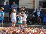 Children scrambled to find candies thrown out from the passing floats.