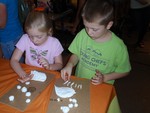 Children made animals out of clay during the celebration.