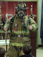 Visitors to the firehouse will see all the firefighting gear.  Seen here: Lt. Robbie Vought.