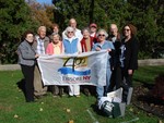 The historical society members gathered to bury the time capsule.