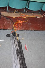 The wiring in the auditorium is unsafe and in need of an upgrade.