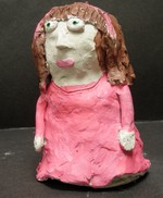 Clay figurine by Lyla Denning.