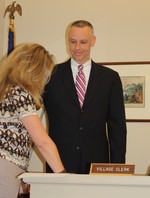 Jim Kane was sworn in as trustee on Monday night by village clerk Jeanne Mahoney.
