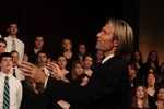 Eric Whitacre conducts a performance of his music.
