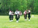 The pipes and drums band.