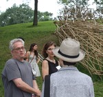 Stephen Talasnik (l) discusses his bamboo creation, Stream: A Folded Drawing, at Storm King Art Center.