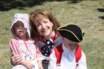 Nan Hayworth brought her campaign for Congress to the celebration, where she met these two costumed children.