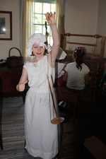 Bridget Wickiser explains how flax was spun into yarn by the 18th-century inhabitants of the Sands Ring house.