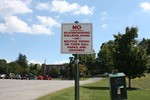 The sign at town halls says skateboarding, rollerskating and bike riding is prohibited.