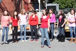 The Love Notes, an acapella group from the high school, performed at the Bridge Street stage.