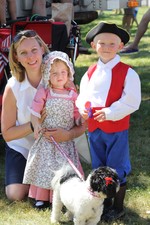 Christine McDonald and the couple's two children at the Independence Day celebration.