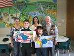 From left, front: Christopher Robinson, 1st place; Joshua Hwang, runner up; back: judge Barbara Gioa; art teacher Gina Dianis; and judge Bob Rosenberger (Not pictured: Judge Sue Fink ).