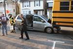 Chief Todd Hazard investigates the accident in which a Honda minivan was lodged underneath a school bus.