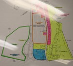In the plan, the yellow area is the existing campus, the pink area is the area designated for residential houses and lots, the blue area is potentially residential or commercial, the green area across 9W is The Farm, and the orange area is the playing fields and stables.