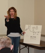 Kris Seiz showed village board members a drawing of the village square that showed where the ball drop will happen.