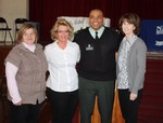 Announcing plans for NYMA's new elementary program (left to right): Nancy Mahoney, Helen Bunt, Maj. Coverdale and Susan Jones. 