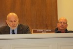 Mayor Gross and Trustee Vatter listened while fellow board members thanked them for their service.
