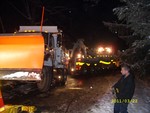 The dump truck was pulled back onto the solid roadway.
