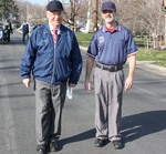 Chaplain Herschberger and Umpire Jim Schilling led the annual parade.