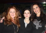 Celebrity committee members Mary Ellen Sayegh (left) and Kathy Sheehan (right) and event attendee Carrie Czumack (center).