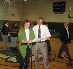 BOE vice president Melanie Robinson and Assit. Superintendent Harvey Sotland announce the vote results.