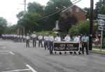 The NYMA band marched past 2 Alices.