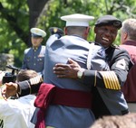 Master Sgt. Bailey greets a graduate.