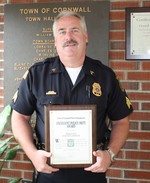 Sgt. Dixon received a plaque honoring his excellent police work last year..