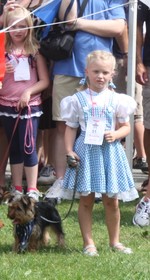 This young Dorothy and her dog waited to hear the results of the competition.