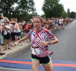 Aisling Cuffe crosses the finish line in the Main Street Mile.