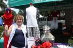 Regina McGrade introduced the Encore Consignment shop in a booth at the 4th of July celebration.