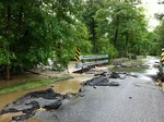 This bridge on Boulevard near the golf course was impassable after being torn up by storm water.