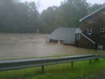 Black Rock Clubhouse submerged by the waters of Woodbury Creek.  Photo by Tom Sullivan.