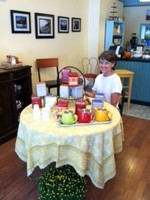 Carol Loggia and some of the teas served at the shop.