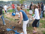 Students spread mulch last fall