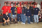 Members of the SKFE Co. #2 posed with their trophy for Best Overall Fire Company 2011.