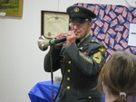 Abby Mayer played his military bugle, dressed in full uniform.