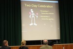 School board members watched a language student presentation on the Day of the Dead.