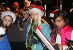 Musicians in the middle school band entertaintained the crowd.