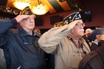 Paul Oser, commander of the county American Legion, and John Raszcewski, of American Legion Post 1161, stood at attention while the national anthem was performed.