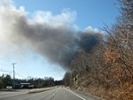 A view of the smoke filtering over Route 9W.  Photo by Jim Lawless.